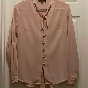 Blush pink button down blouse with tie around neck